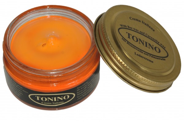 Orange Tonino leather cream in the glass. Care + protection.